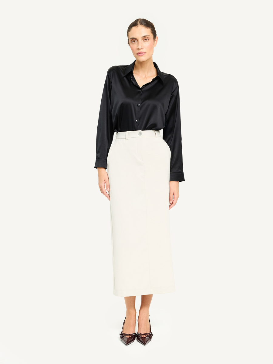 Beżowa ołówkowa spódnica midi z rozporkiem i kieszeniami