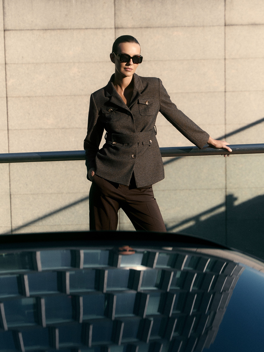 Brown fitted blazer with belt and decorative buttons