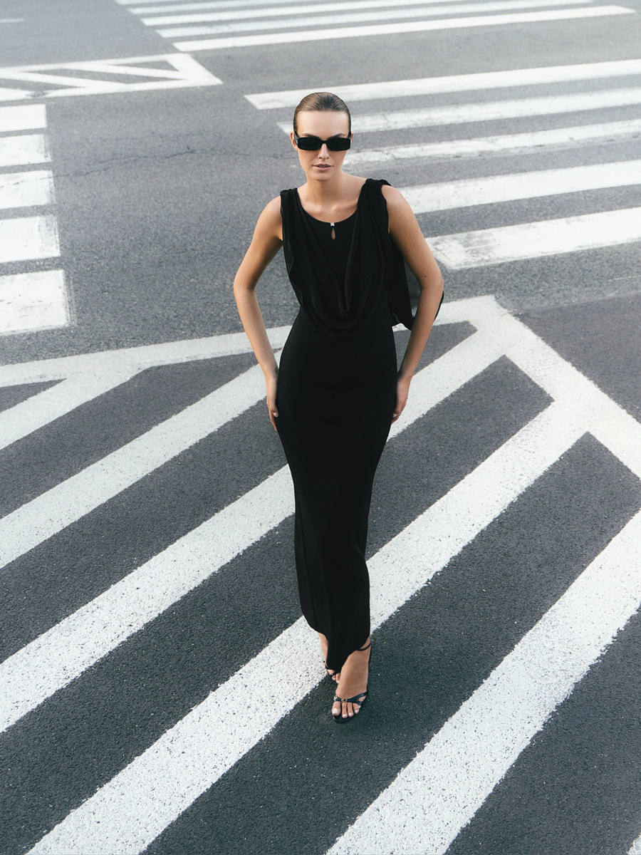 Black evening dress with chiffon draping