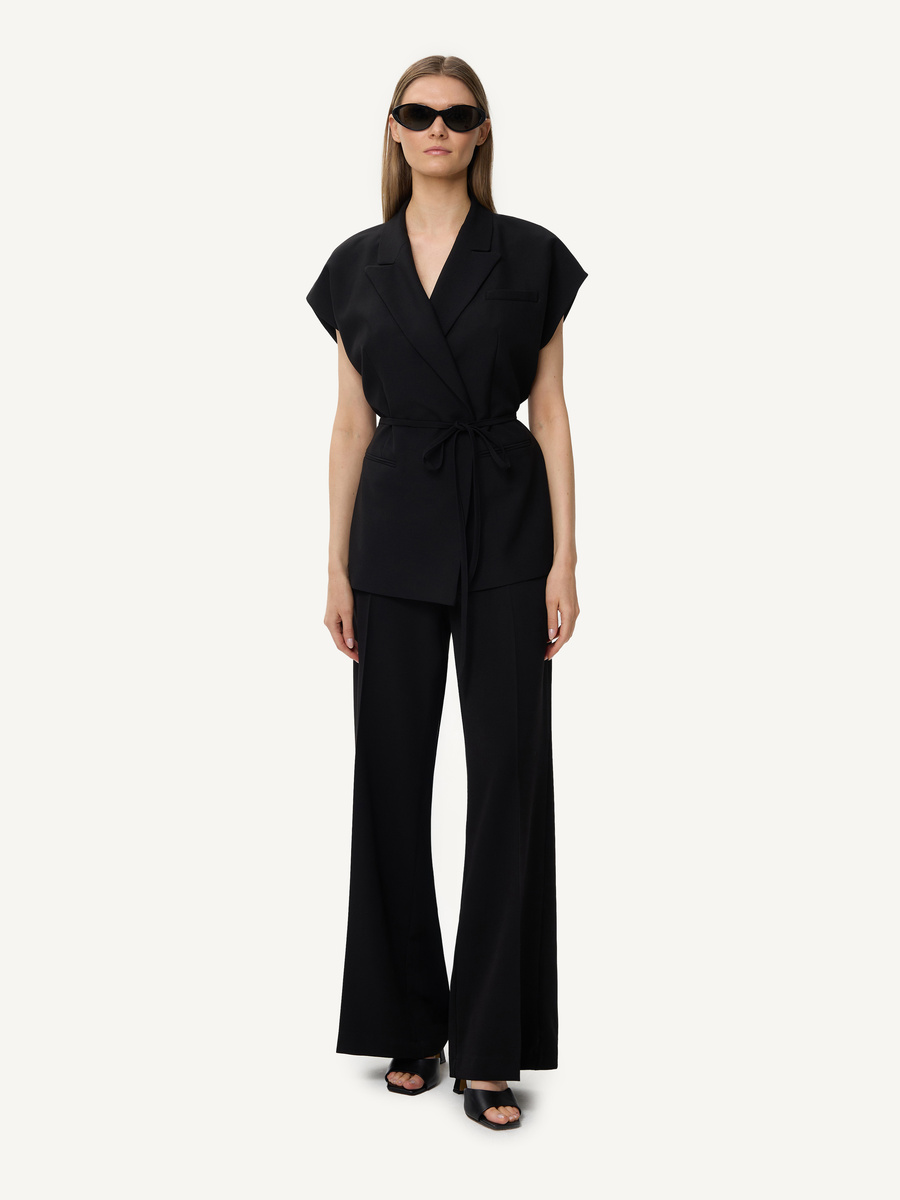 Wide-leg trousers with pressed crease and side zip – black