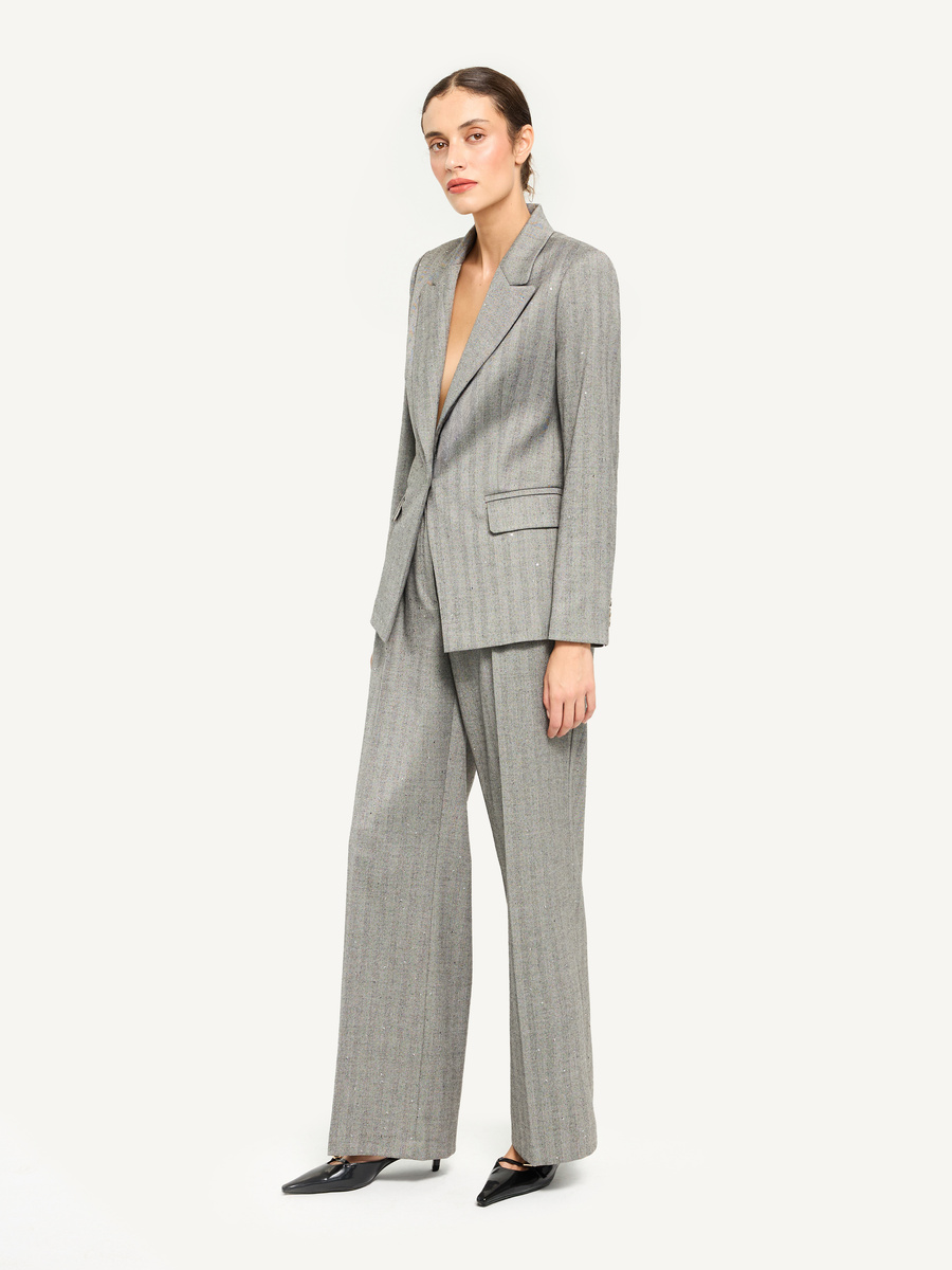 Grey herringbone suit with subtle all-over paillettes