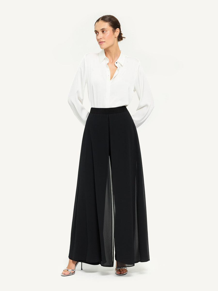 White shirt with decorative silver buttons