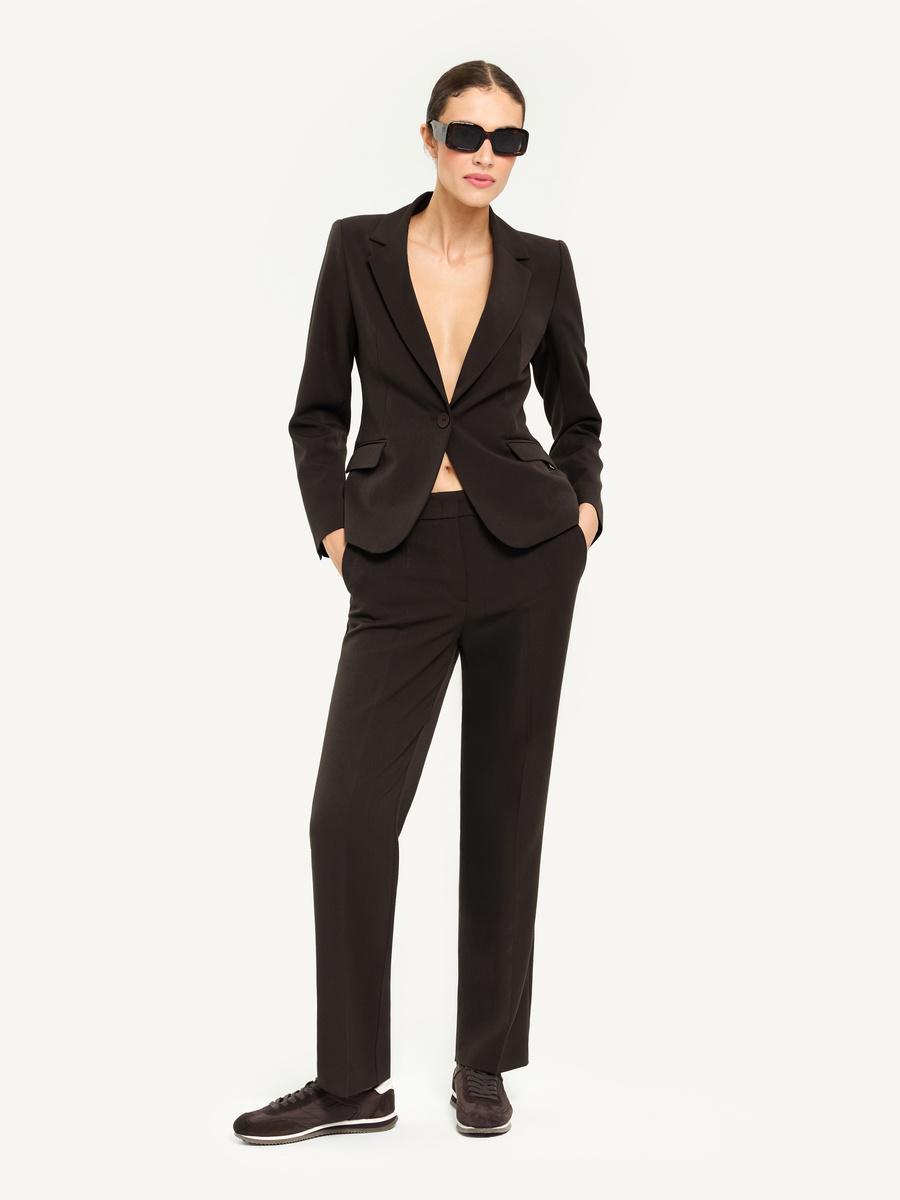 Brown suit with deep neckline